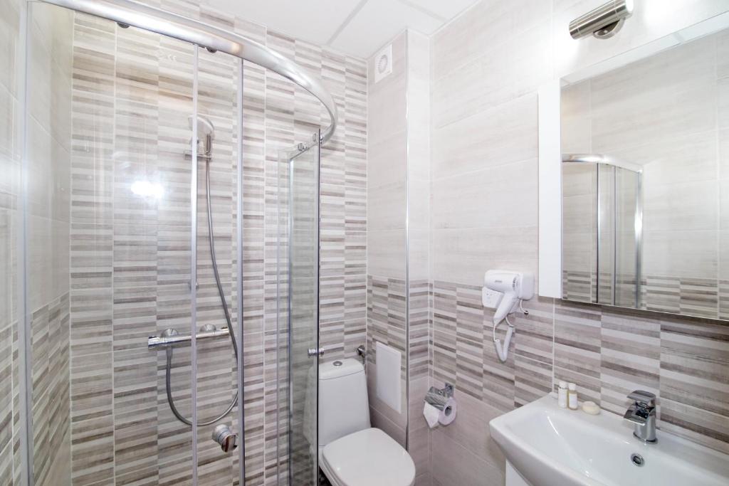 Koupelna v ubytování Four seasons apartment - Oasis beach resort