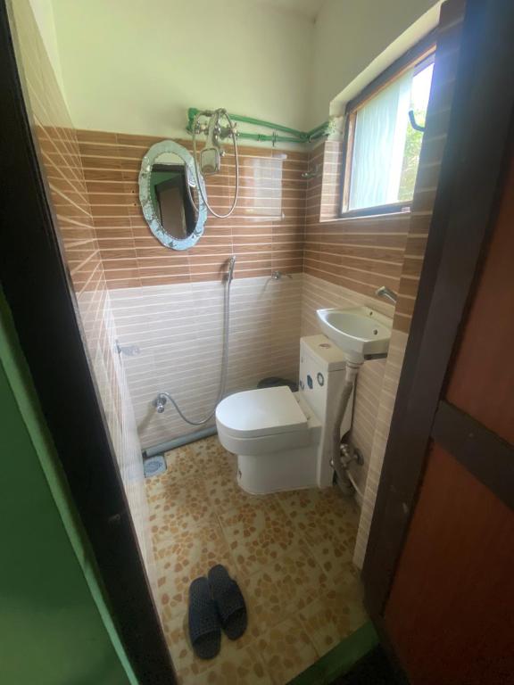 A bathroom at The Nest Guest House