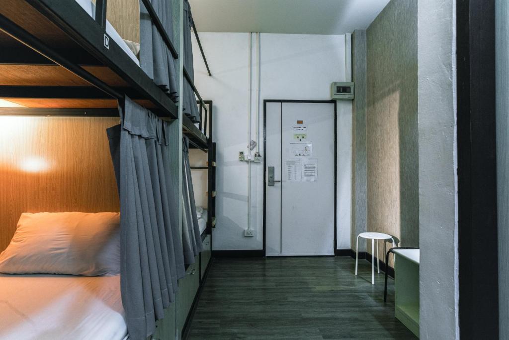 Postel nebo postele na pokoji v ubytování Connect Hotel Chiang Rai