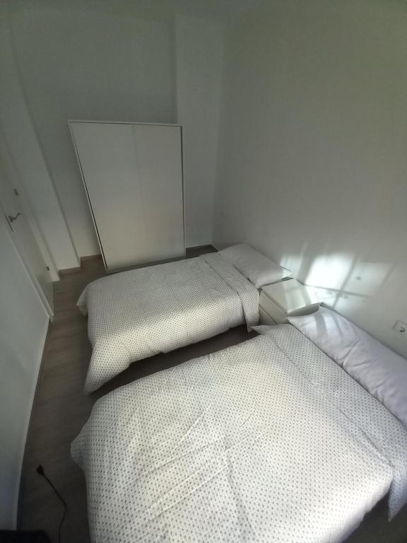 Postel nebo postele na pokoji v ubytování All Season Flat