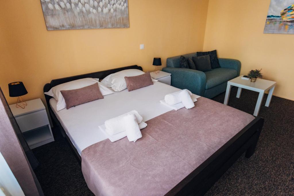 Postel nebo postele na pokoji v ubytování Laguna Green Guest House