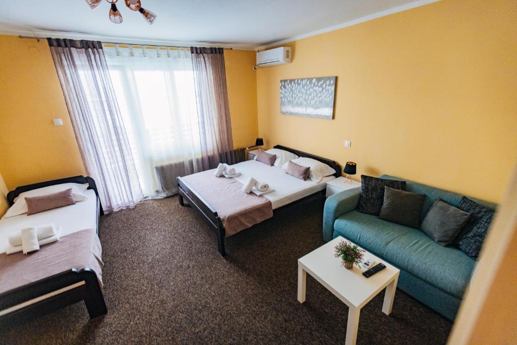 Postel nebo postele na pokoji v ubytování Laguna Green Guest House