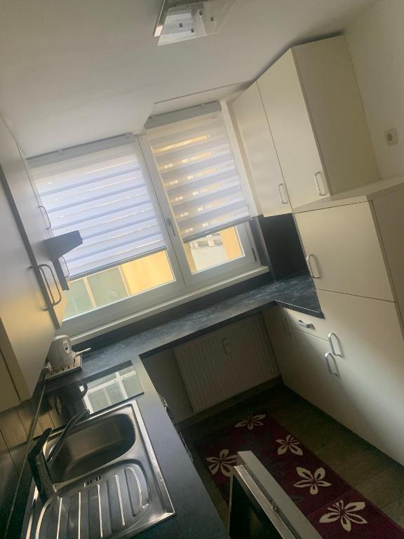 Kuchyňa alebo kuchynka v ubytovaní Smart Stay Apartment Feldkirch