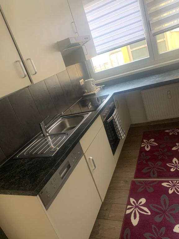 Kuchyňa alebo kuchynka v ubytovaní Smart Stay Apartment Feldkirch