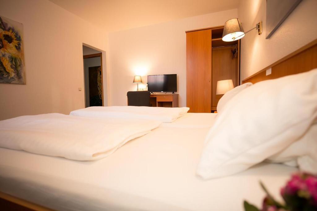 Voodi või voodid majutusasutuse Hotel Weiße Mühle toas
