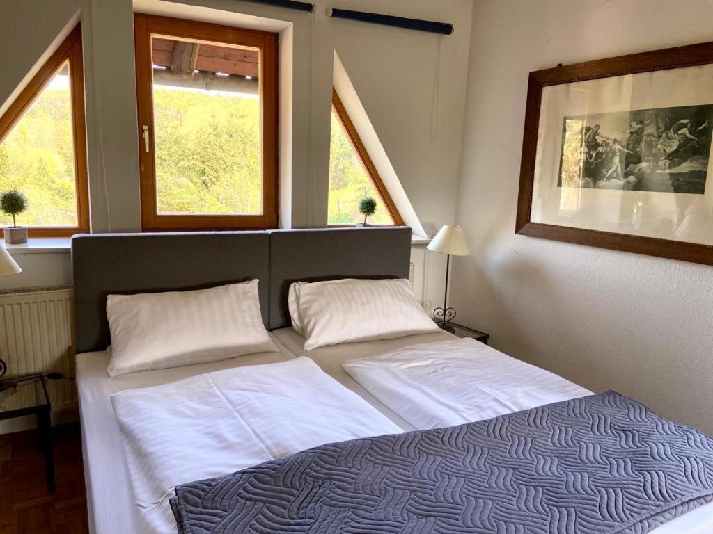 Voodi või voodid majutusasutuse Hotel Weiße Mühle toas