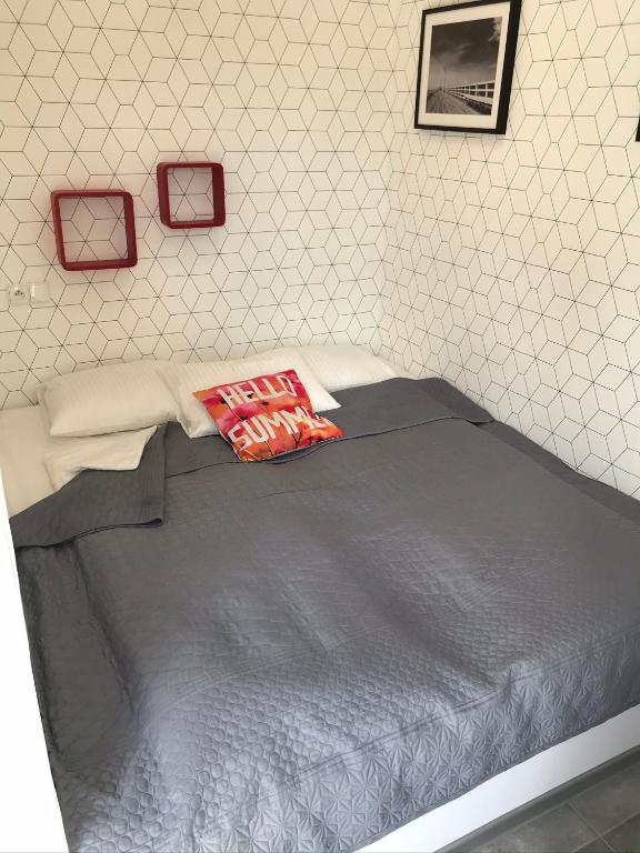 Posteľ alebo postele v izbe v ubytovaní Apartament lawendowy - nad morzem z tarasem i garażem 5 min od plaży