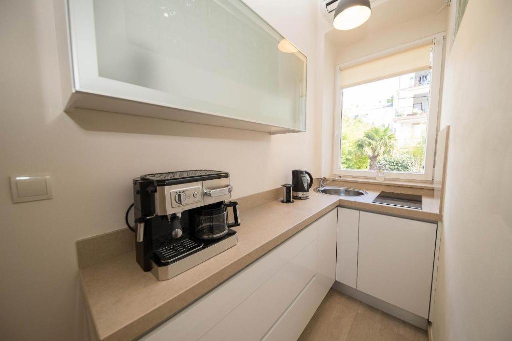 Kuchyňa alebo kuchynka v ubytovaní Apartmani Marion Crikvenica