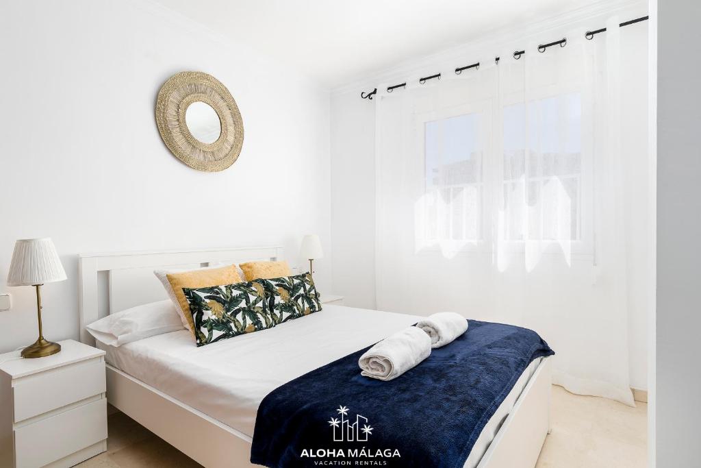 A bed or beds in a room at Wonderful Malaga Centro Apartment