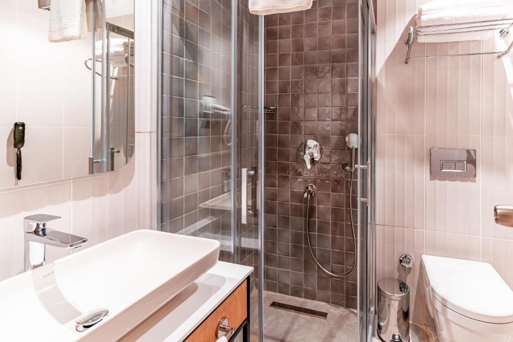 Koupelna v ubytování PEARLY HOTEL