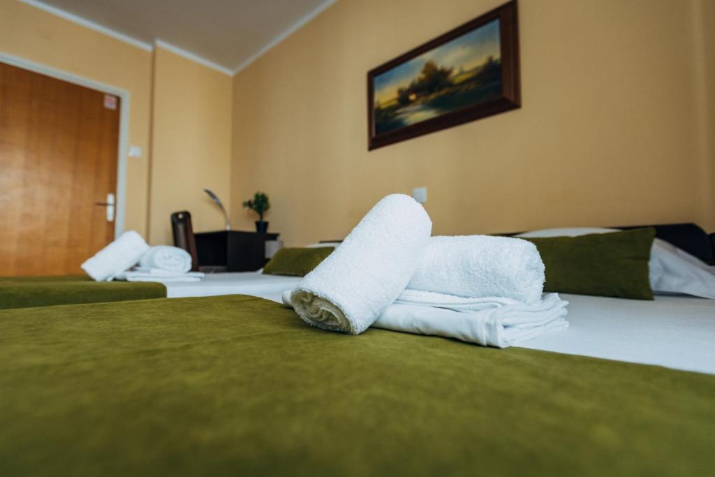 Postel nebo postele na pokoji v ubytování Laguna Green Guest House