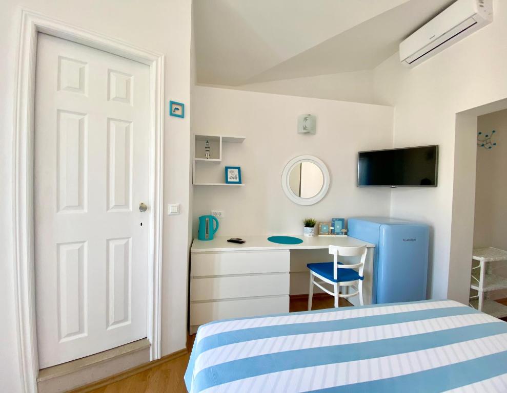 Postel nebo postele na pokoji v ubytování Apartmani Marko