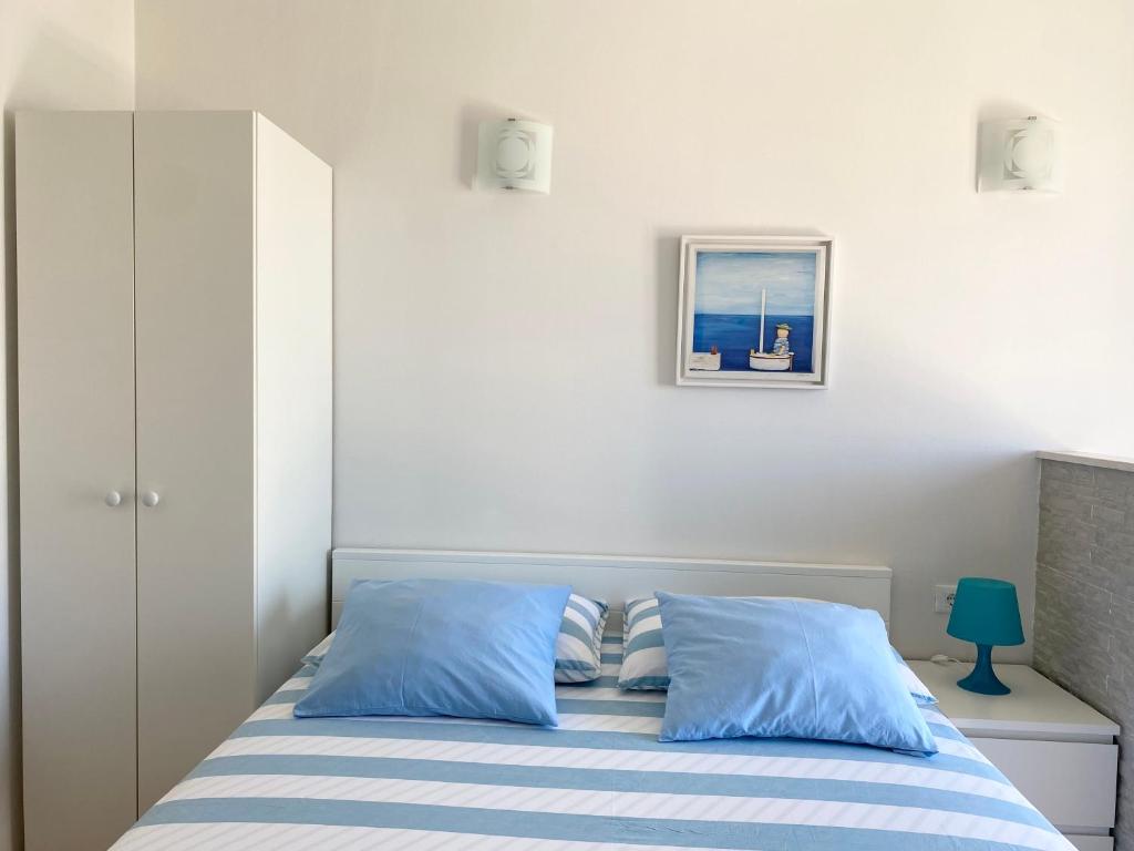 Postel nebo postele na pokoji v ubytování Apartmani Marko