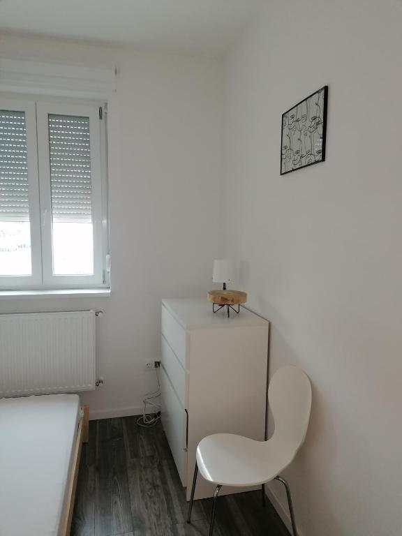 Postel nebo postele na pokoji v ubytování FlóDá Ház