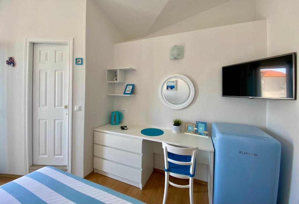 Postel nebo postele na pokoji v ubytování Apartmani Marko