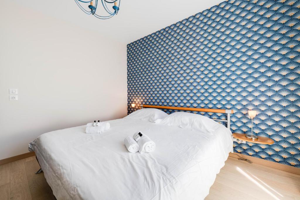 Posteľ alebo postele v izbe v ubytovaní Emergence - Apartment 1 bedroom 2-4 pers Garage and Terrace