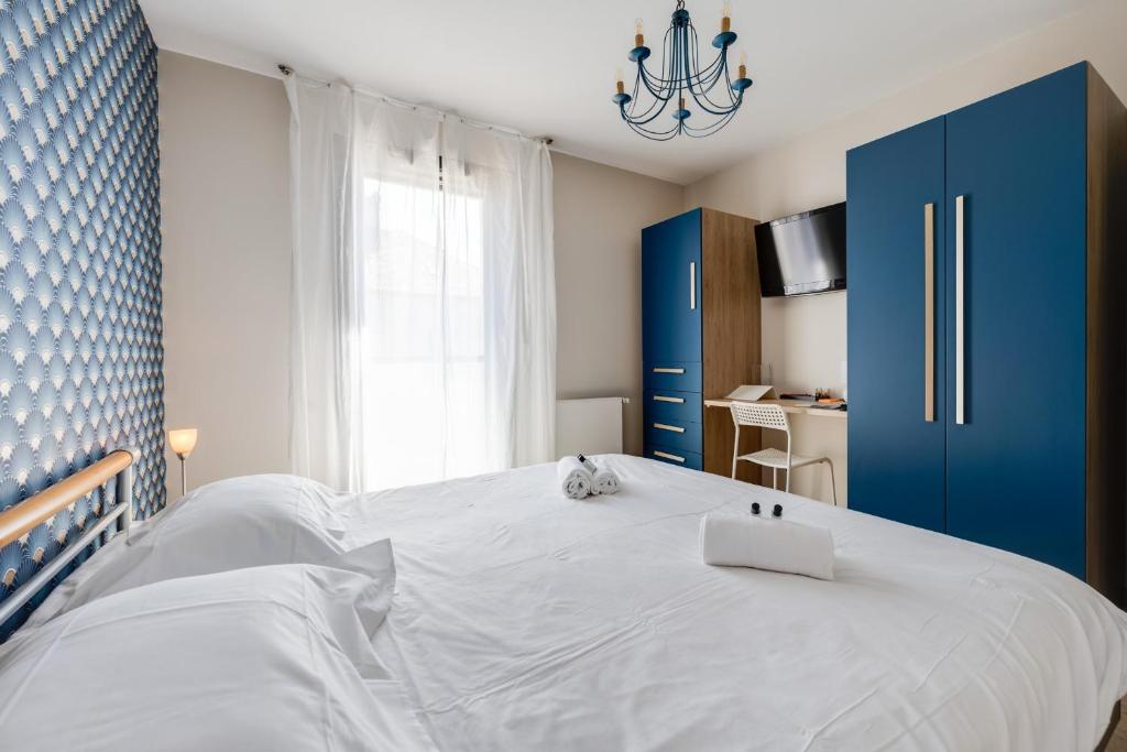 Posteľ alebo postele v izbe v ubytovaní Emergence - Apartment 1 bedroom 2-4 pers Garage and Terrace