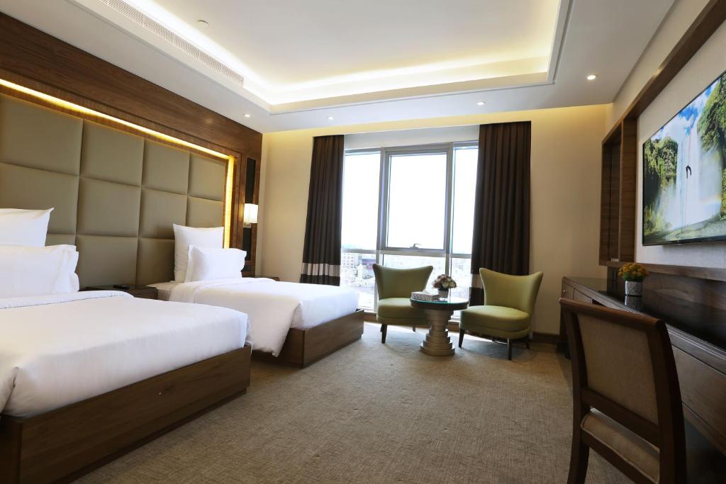 Voodi või voodid majutusasutuse Weekend Hotel Sari toas