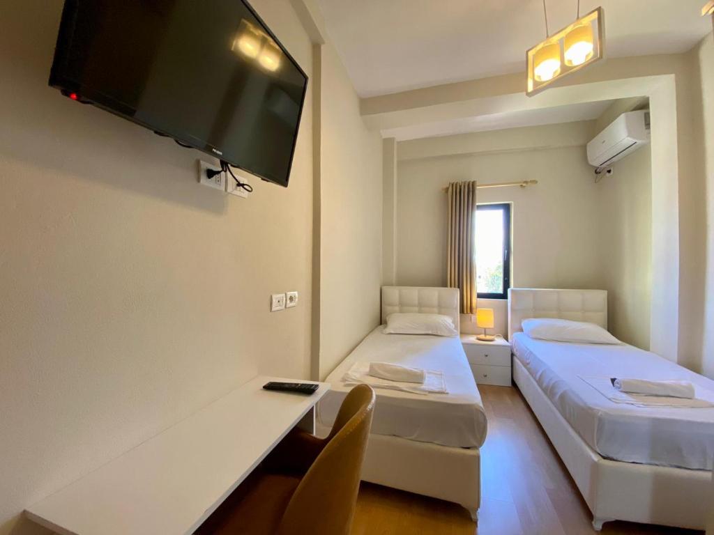 Postel nebo postele na pokoji v ubytování Hotel Globo