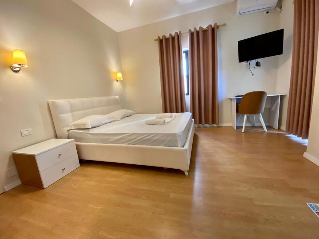 Postel nebo postele na pokoji v ubytování Hotel Globo