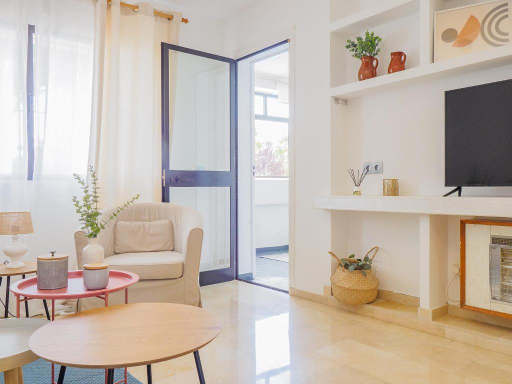 TV a/nebo společenská místnost v ubytování Cubo's Apartamento Las Acacias Beach
