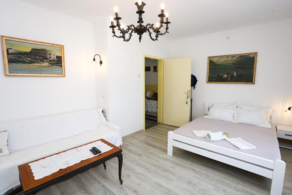 Postel nebo postele na pokoji v ubytování Vila Skala