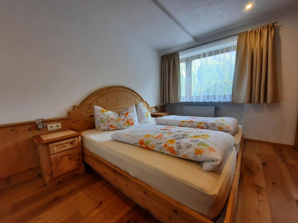 Postel nebo postele na pokoji v ubytování Haus Bergblick