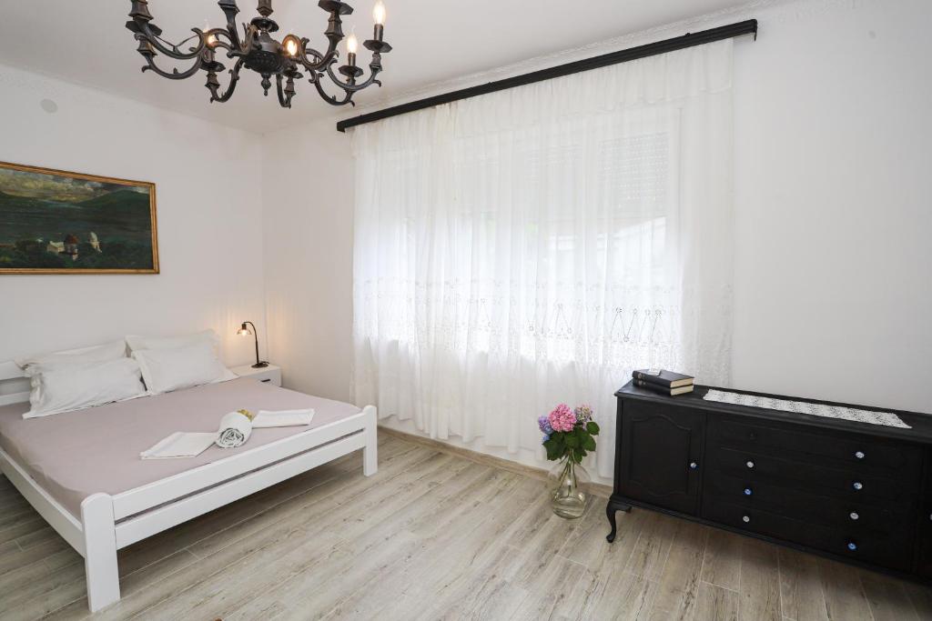 Postel nebo postele na pokoji v ubytování Vila Skala