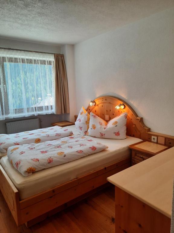 Postel nebo postele na pokoji v ubytování Haus Bergblick