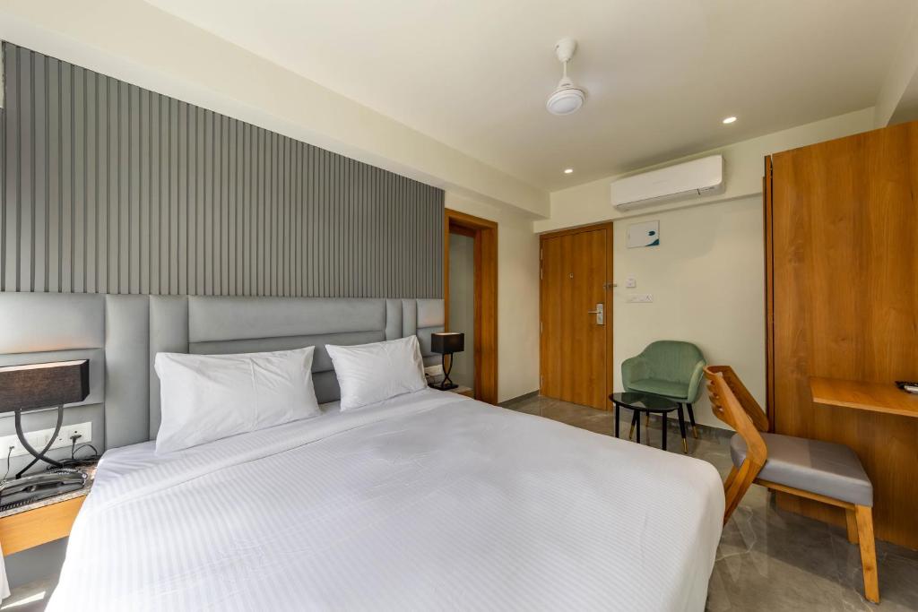 Postel nebo postele na pokoji v ubytování Hotel Nalanda