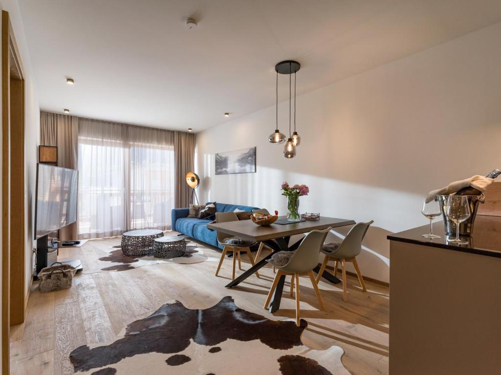 Posedenie v ubytovaní Apartment Liebelei am See - Traumblick aufs Kaisergebirge - nur ein Katzensprung zum See