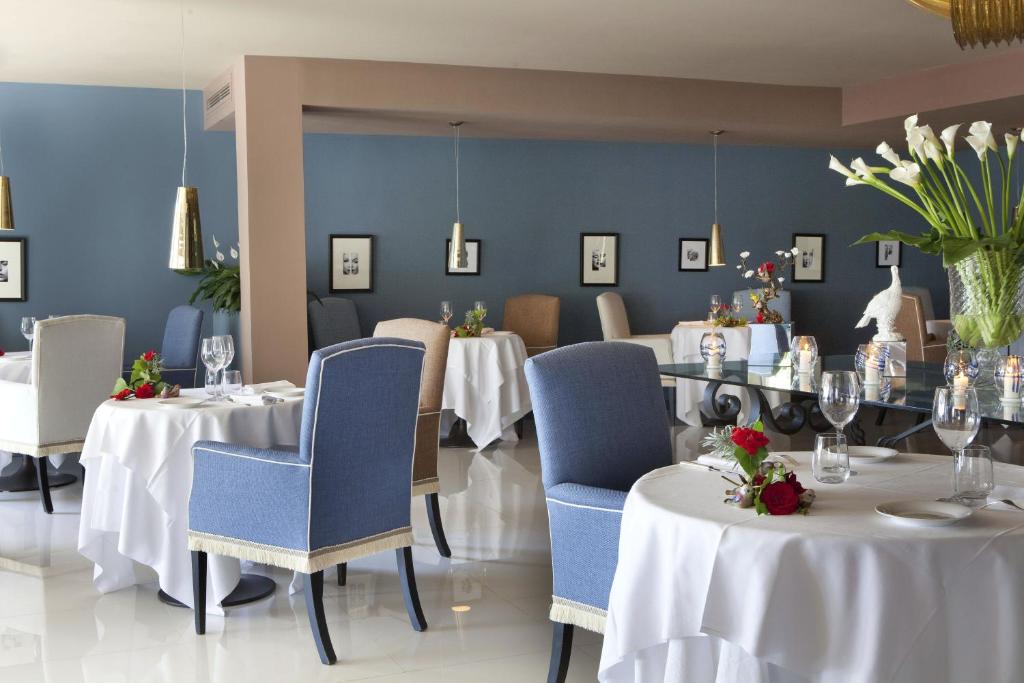 Гостиная зона в Cala del Porto Punta Ala - Preferred Hotels