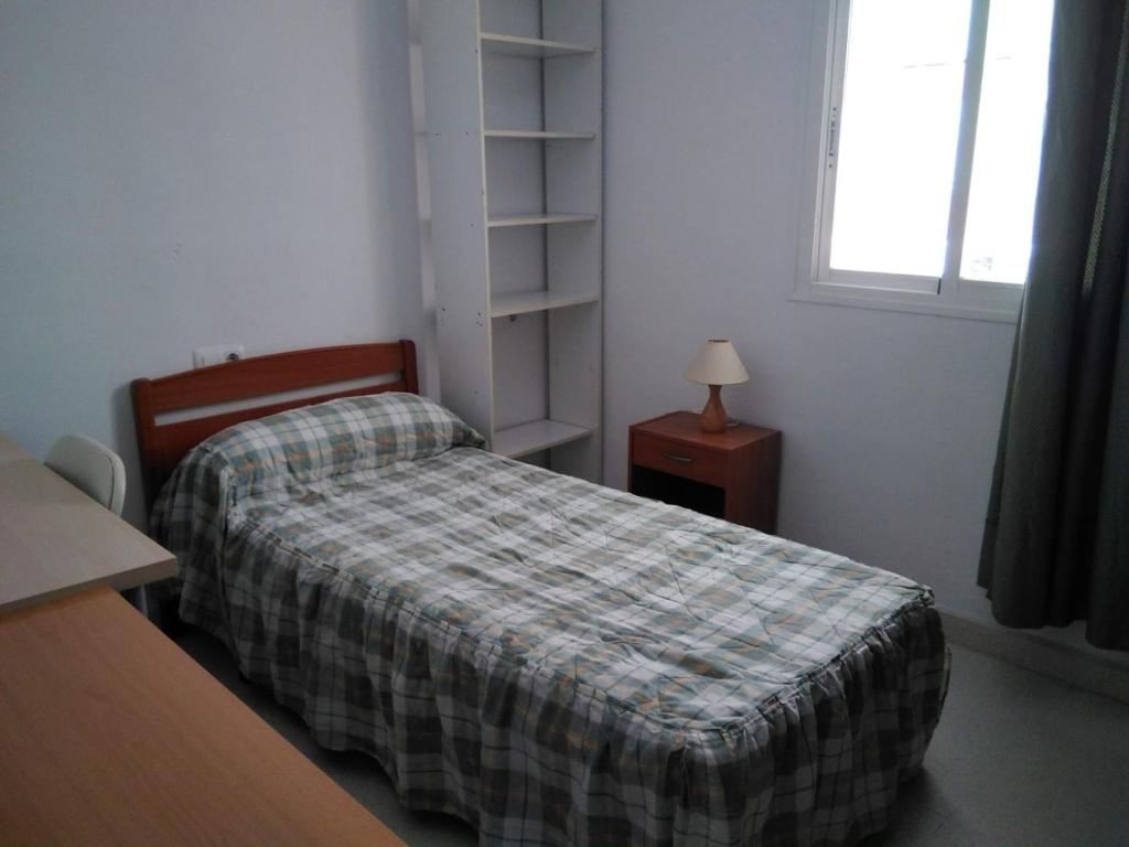 Posteľ alebo postele v izbe v ubytovaní TORRE ATALAYA House