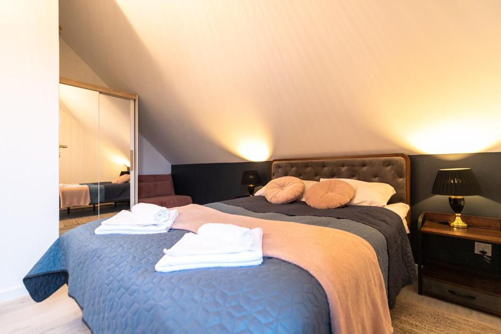 Posteľ alebo postele v izbe v ubytovaní Apartament Liściasty 2 z widokiem na góry - Dream Apart