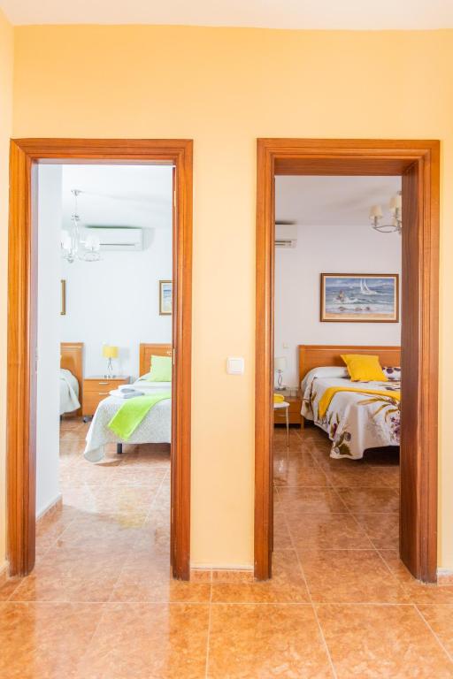 A bed or beds in a room at Villa Bella Lucia Luxury 2