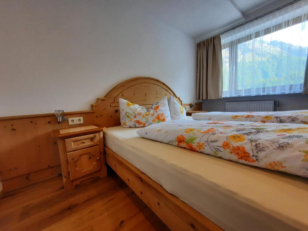 Postel nebo postele na pokoji v ubytování Haus Bergblick