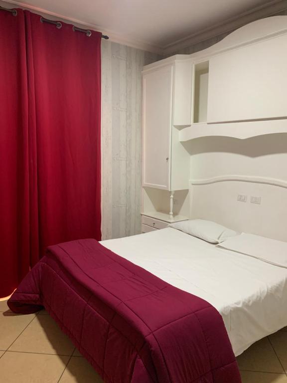 Postel nebo postele na pokoji v ubytování Hotel Tiffany