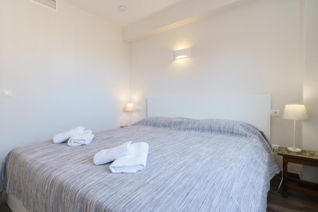 Posteľ alebo postele v izbe v ubytovaní Apartment Acapulco 6