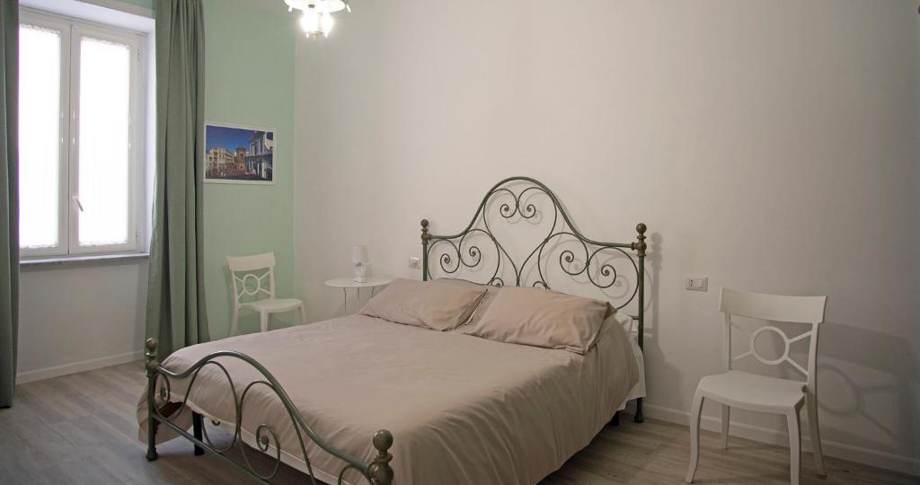 Giường trong phòng chung tại Casa Rachele Napoli