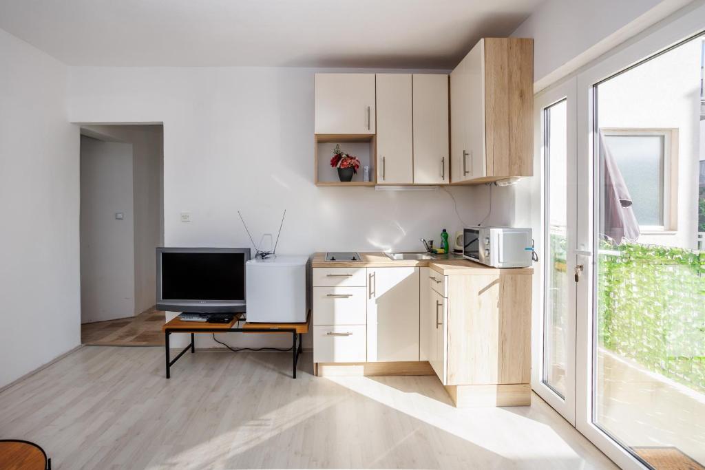 Kuchyňa alebo kuchynka v ubytovaní Apartment ANA Podstrana