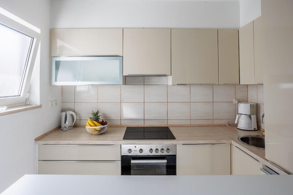 Kuchyňa alebo kuchynka v ubytovaní Apartment ANA Podstrana