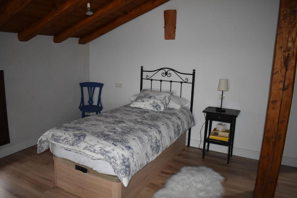 Postel nebo postele na pokoji v ubytování Tierras de Aguilera