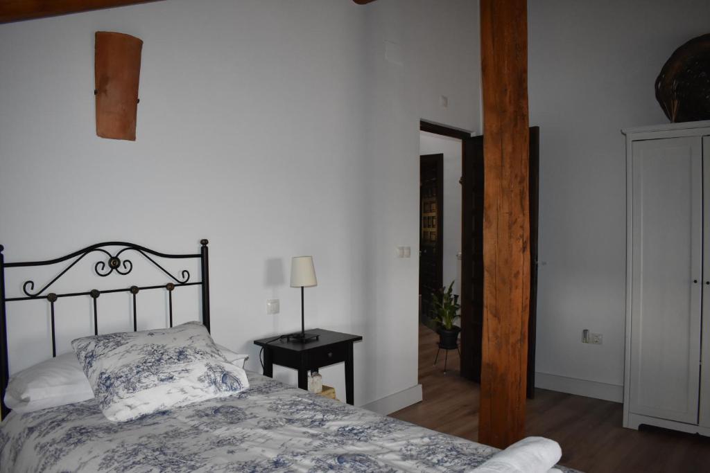 Postel nebo postele na pokoji v ubytování Tierras de Aguilera