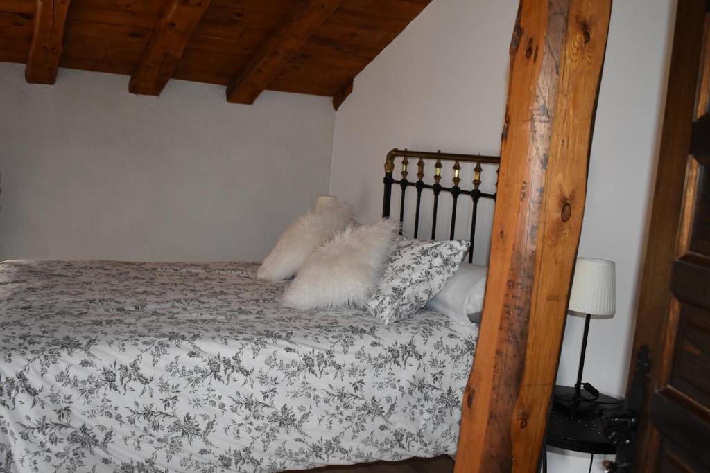 Postel nebo postele na pokoji v ubytování Tierras de Aguilera