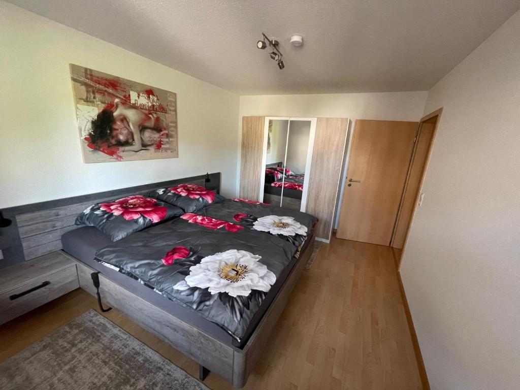 Postel nebo postele na pokoji v ubytování Ferienwohnung Dinkelberg