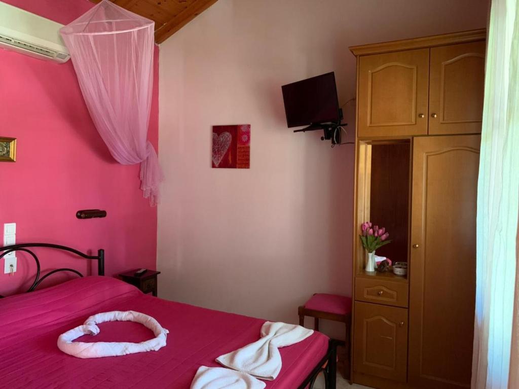 Postel nebo postele na pokoji v ubytování Palma Sidari Corfu