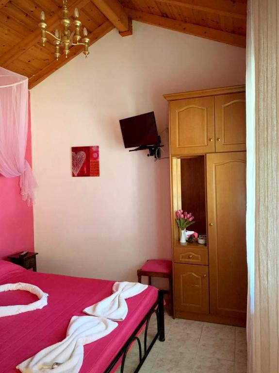 Postel nebo postele na pokoji v ubytování Palma Sidari Corfu