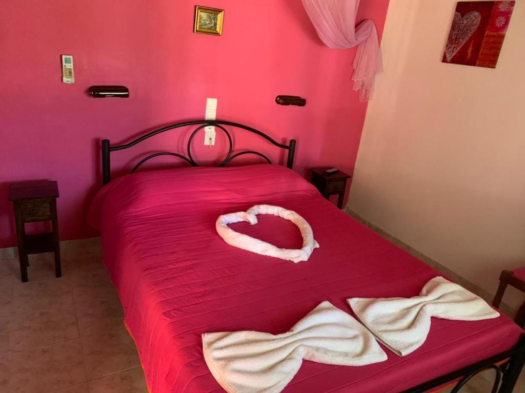 Postel nebo postele na pokoji v ubytování Palma Sidari Corfu