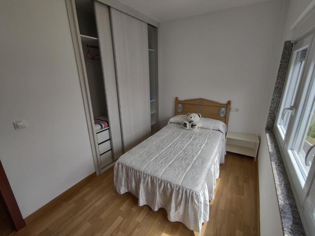 Posteľ alebo postele v izbe v ubytovaní Casa Chouza