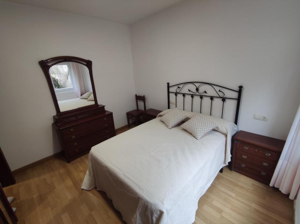 Posteľ alebo postele v izbe v ubytovaní Casa Chouza
